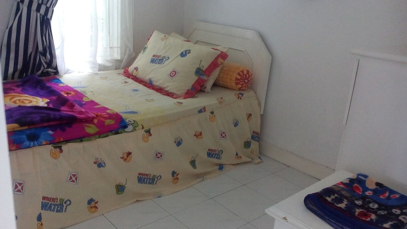 Imagen de la habitación del Hotel Villa Puncak Resort. Foto 15