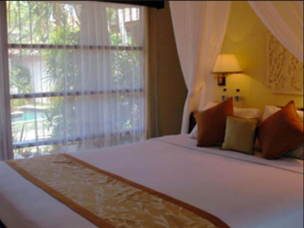 Imagen de la habitación del Hotel Villa Puri Ayu. Foto 6