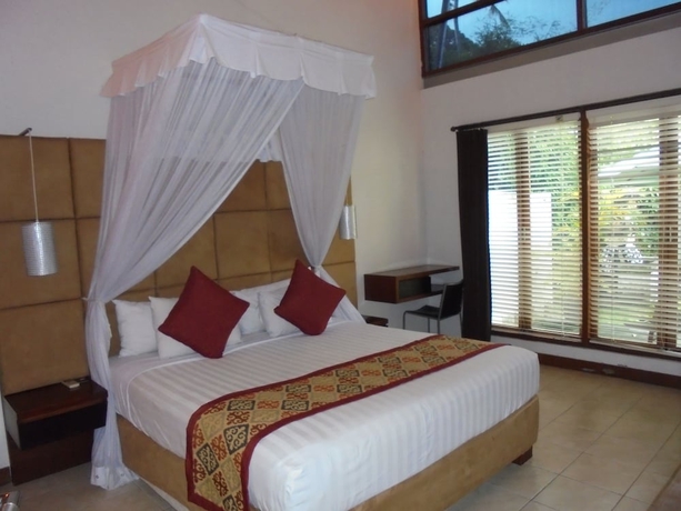 Imagen de la habitación del Hotel Villa Puri Ayu. Foto 9