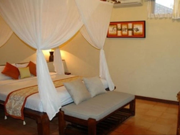 Imagen de la habitación del Hotel Villa Puri Ayu. Foto 13