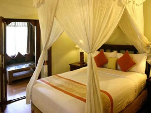Imagen de la habitación del Hotel Villa Puri Ayu. Foto 14