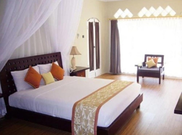 Imagen de la habitación del Hotel Villa Puri Ayu. Foto 16