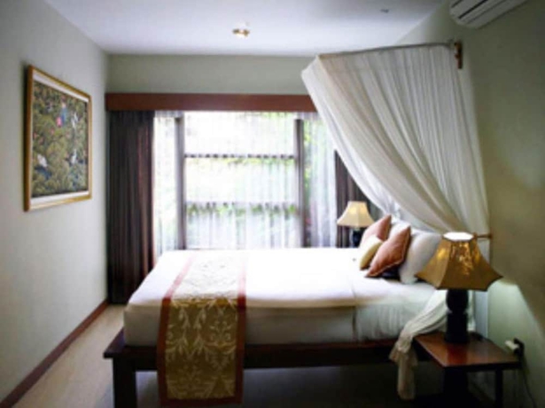 Imagen de la habitación del Hotel Villa Puri Ayu. Foto 17