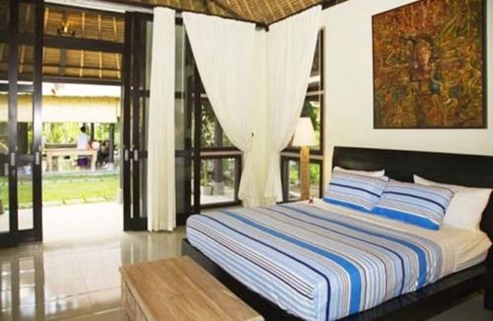 Imagen de la habitación del Hotel Villa Puri Darma Agung. Foto 3