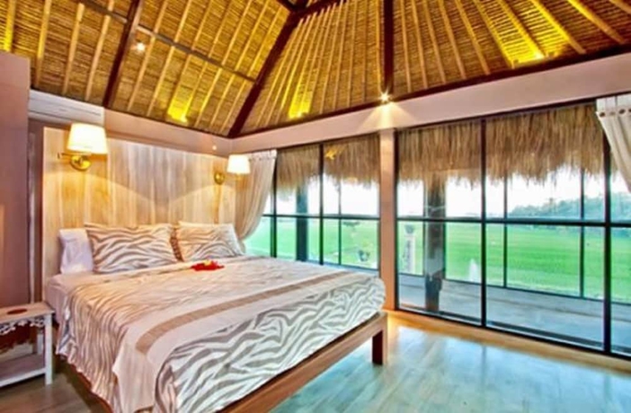 Imagen de la habitación del Hotel Villa Puri Darma Agung. Foto 4
