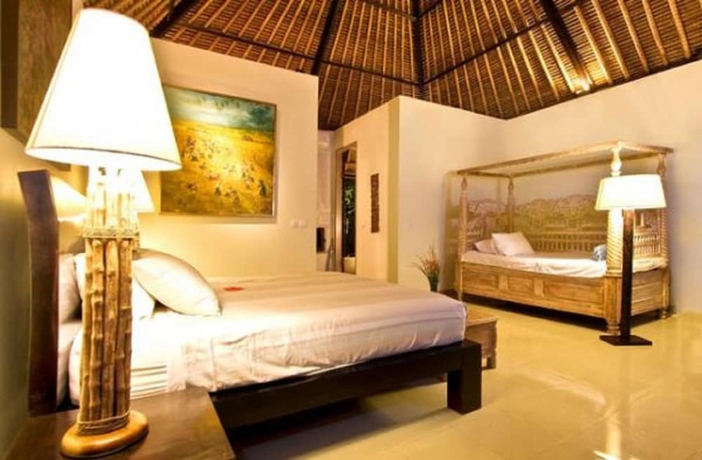 Imagen de la habitación del Hotel Villa Puri Darma Agung. Foto 6