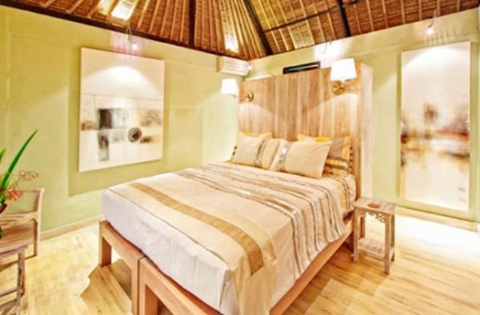 Imagen de la habitación del Hotel Villa Puri Darma Agung. Foto 8