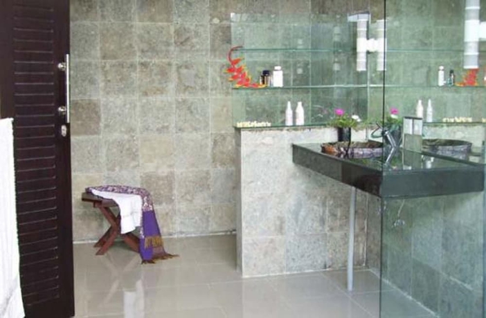 Imagen de la habitación del Hotel Villa Puri Darma Agung. Foto 11