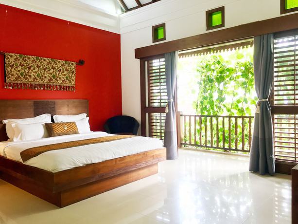Imagen de la habitación del Hotel Villa Puriartha Ubud. Foto 4