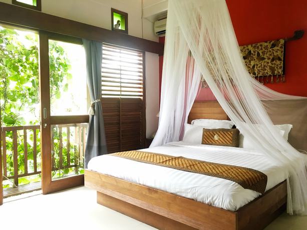Imagen de la habitación del Hotel Villa Puriartha Ubud. Foto 9