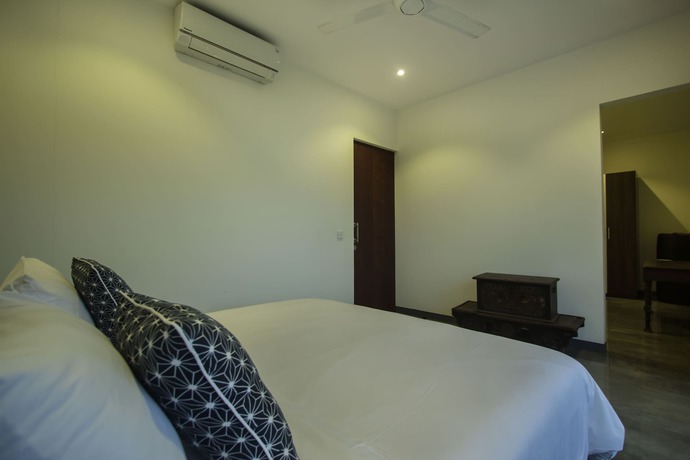 Imagen de la habitación del Hotel Villa Rainbow Runner. Foto 4