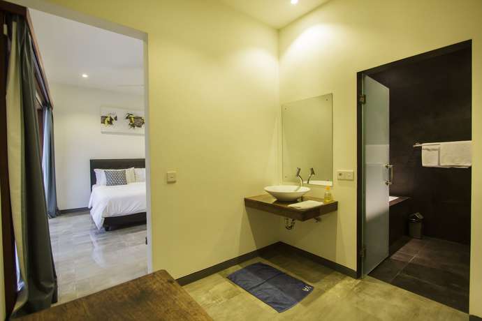 Imagen de la habitación del Hotel Villa Rainbow Runner. Foto 6