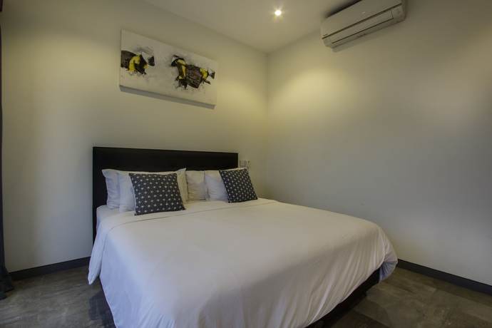 Imagen de la habitación del Hotel Villa Rainbow Runner. Foto 7