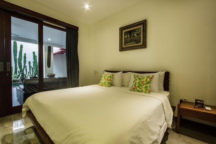Imagen de la habitación del Hotel Villa Rainbow Runner. Foto 8
