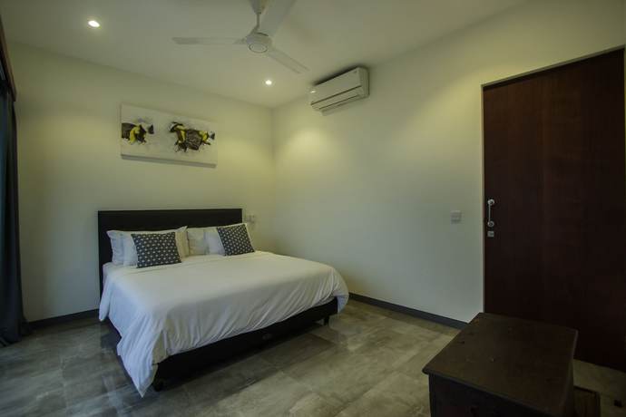 Imagen de la habitación del Hotel Villa Rainbow Runner. Foto 9