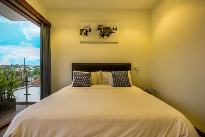 Imagen de la habitación del Hotel Villa Rainbow Runner. Foto 10