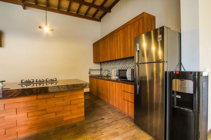 Imagen de la habitación del Hotel Villa Rainbow Runner. Foto 12