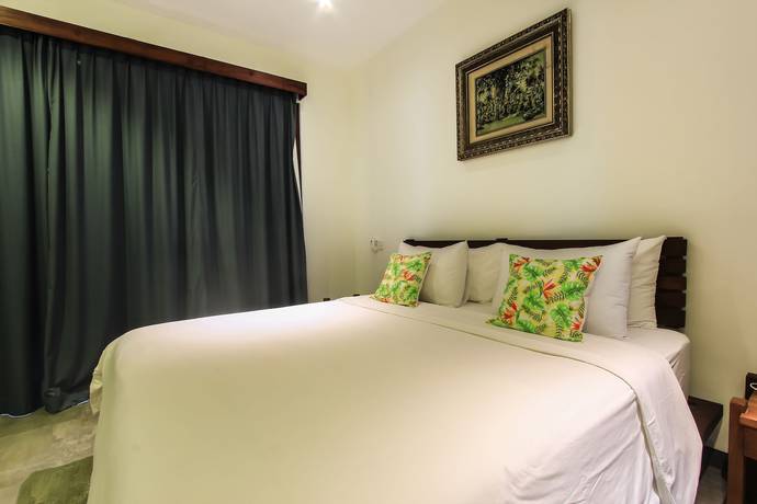 Imagen de la habitación del Hotel Villa Rainbow Runner. Foto 15