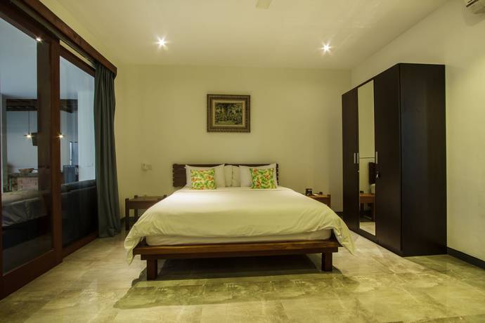 Imagen de la habitación del Hotel Villa Rainbow Runner. Foto 16