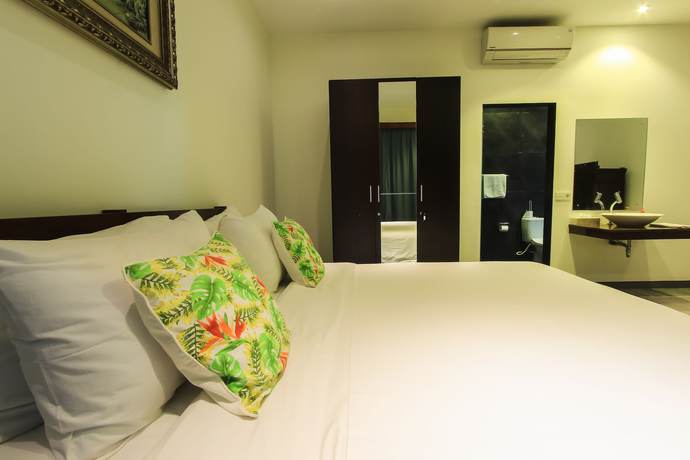 Imagen de la habitación del Hotel Villa Rainbow Runner. Foto 20