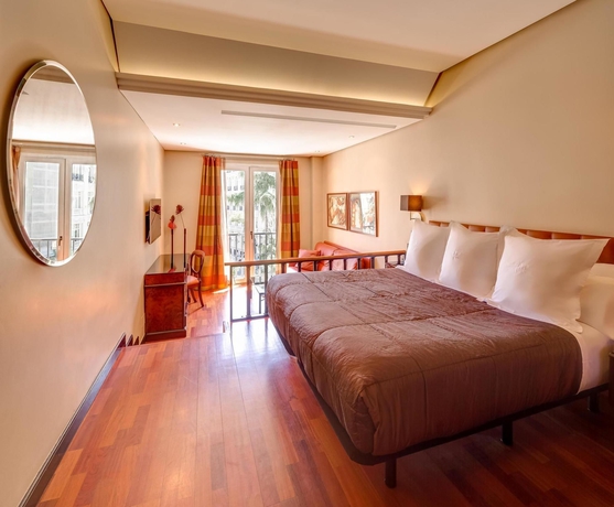 Imagen de la habitación del Hotel Villa Real. Foto 12