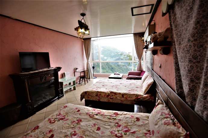 Imagen de la habitación del Hotel Villa Relax, Ren'ai. Foto 11