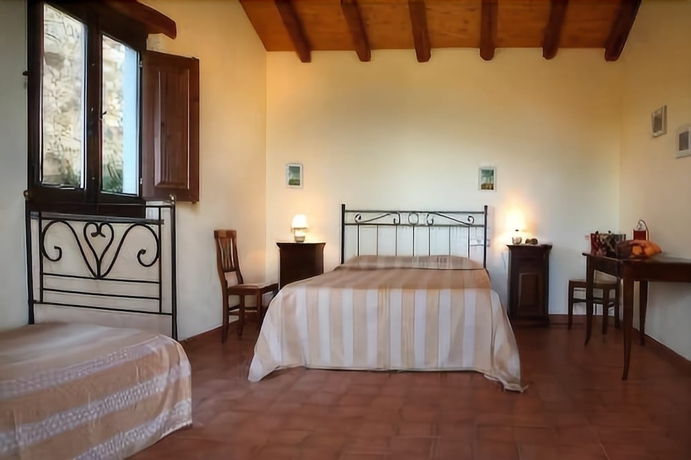 Imagen de la habitación del Hotel Villa Rica, Sicilia. Foto 10