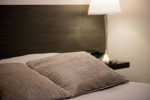 Imagen de la habitación del Hotel Villa Riva. Foto 7