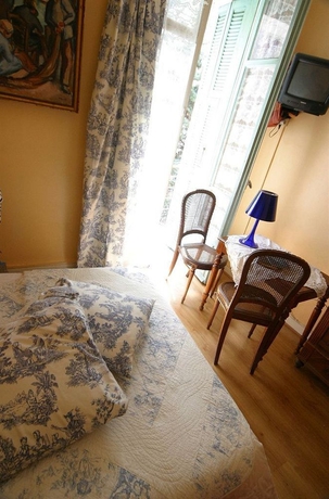 Imagen de la habitación del Hotel Villa Rivoli. Foto 2