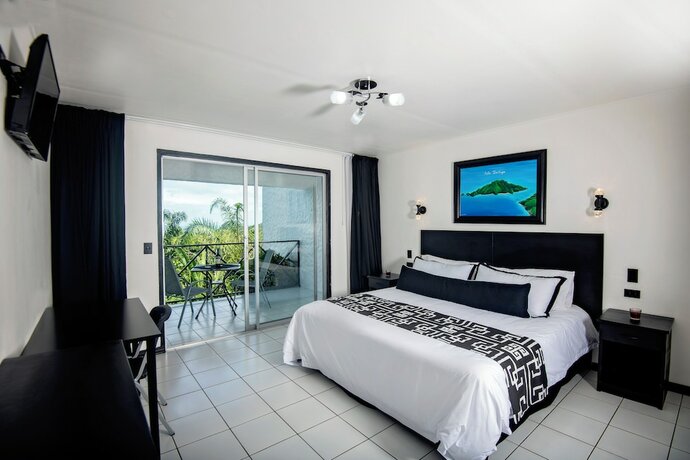 Imagen de la habitación del Hotel Villa Roca Boutique Resort and Suites-ADULT ONLY. Foto 18