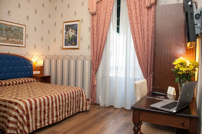 Imagen de la habitación del Hotel Villa Romeo. Foto 12