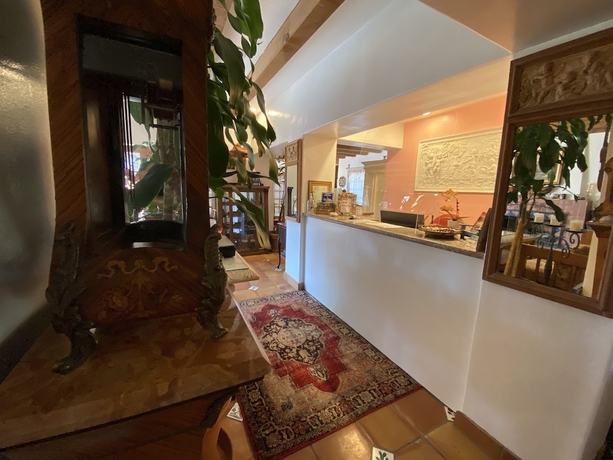 Imagen de los interiores del Hotel Villa Rosa Inn. Foto 14