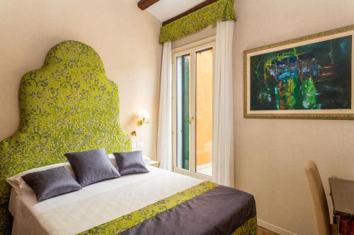 Imagen de la habitación del Hotel Villa Rosa, Venecia. Foto 12