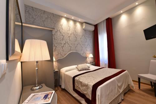 Imagen de la habitación del Hotel Villa Rosa, Venecia. Foto 14