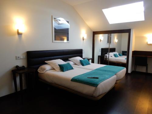 Imagen de la habitación del Hotel Villa Rosario II. Foto 6