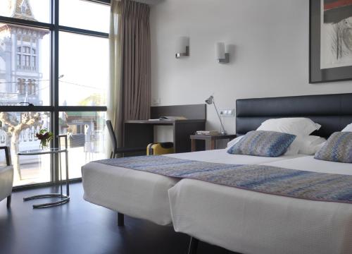 Imagen de la habitación del Hotel Villa Rosario II. Foto 7