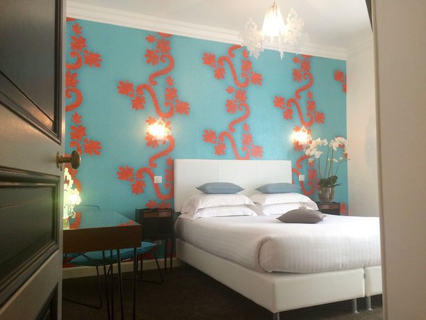 Imagen de la habitación del Hotel Villa Rose. Foto 16