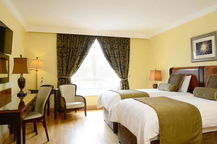 Imagen de la habitación del Hotel Villa Rose Hotel and Spa. Foto 15