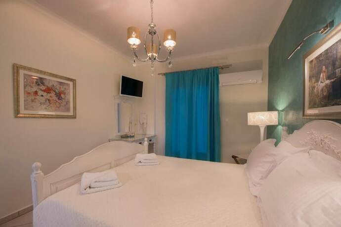 Imagen de la habitación del Hotel Villa Rose, Ormos Athinios. Foto 19