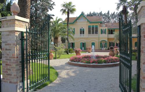 Imagen de la habitación del Hotel Villa Rosella Resort. Foto 6