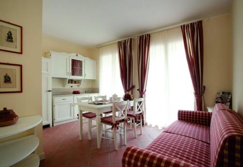 Imagen de la habitación del Hotel Villa Rosella Resort. Foto 9