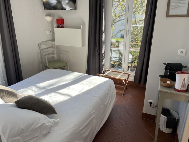 Imagen de la habitación del Hotel Villa Roseraie. Foto 14