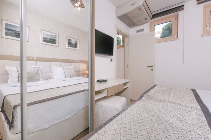 Imagen de la habitación del Hotel Villa Royal Apartments. Foto 7