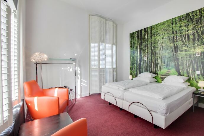 Imagen de la habitación del Hotel Villa Ruimzicht. Foto 20
