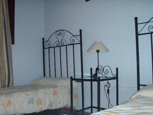 Imagen de la habitación del Hotel Villa Rural Sierra Hueznar. Foto 6