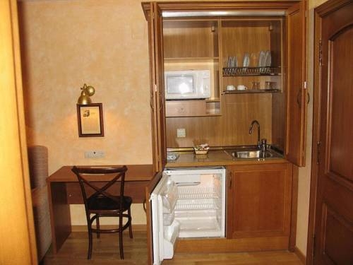 Imagen de la habitación del Hotel Villa Russell. Foto 7