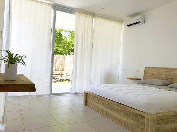 Imagen de la habitación del Hotel Villa Samalas Resort and Restaurant. Foto 37