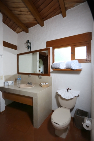 Imagen de la habitación del Hotel Villa San Jose and Suites. Foto 7