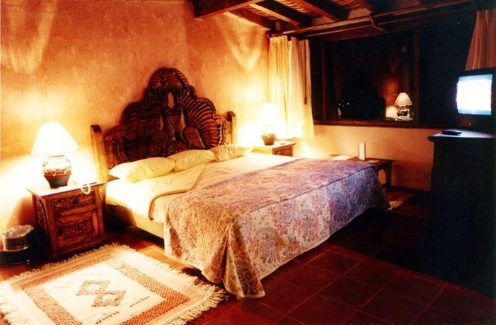 Imagen de la habitación del Hotel Villa San Jose and Suites. Foto 8