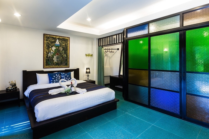 Imagen de la habitación del Hotel Villa San Pee Seua. Foto 13